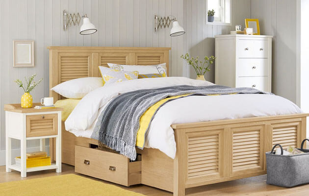 light brown wood bedroom set with white and yellow accents