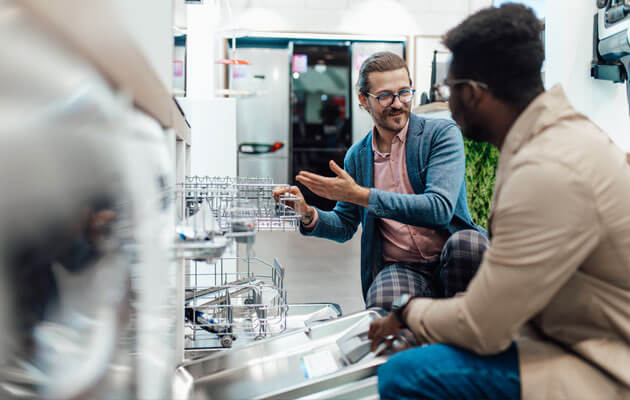 man shopping for dish washing machine