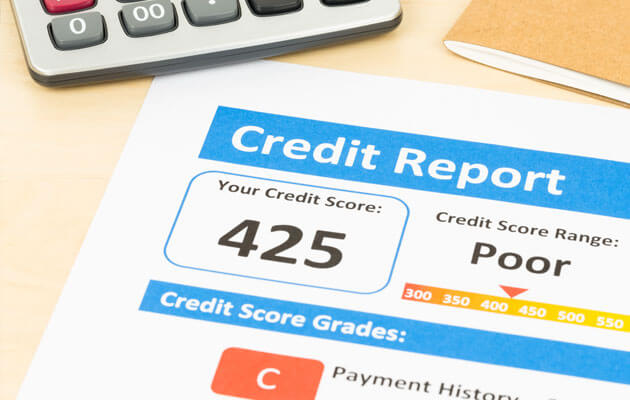 close up of credit report paper with poor score