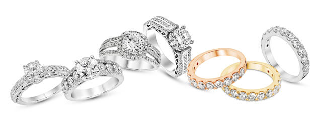 display of engagement rings in silver, rose, and gold