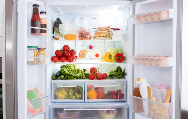 French door fridge open showing food