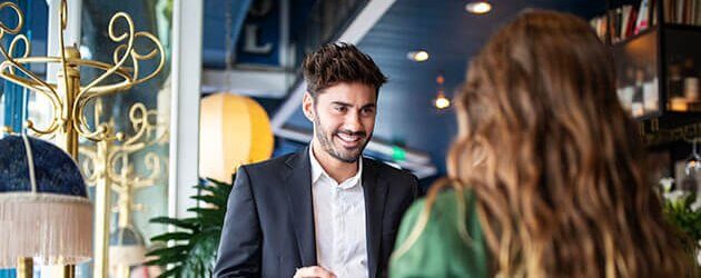 Woman Talking With Salesman