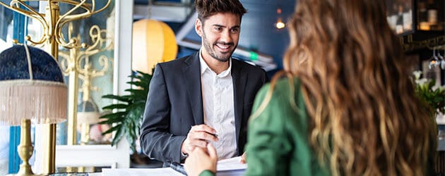 Woman Talking With Salesman