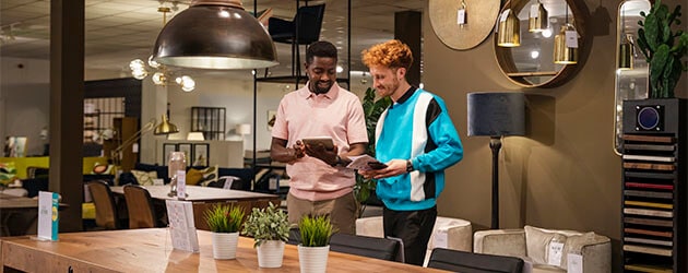 Two Men Shopping For Furniture