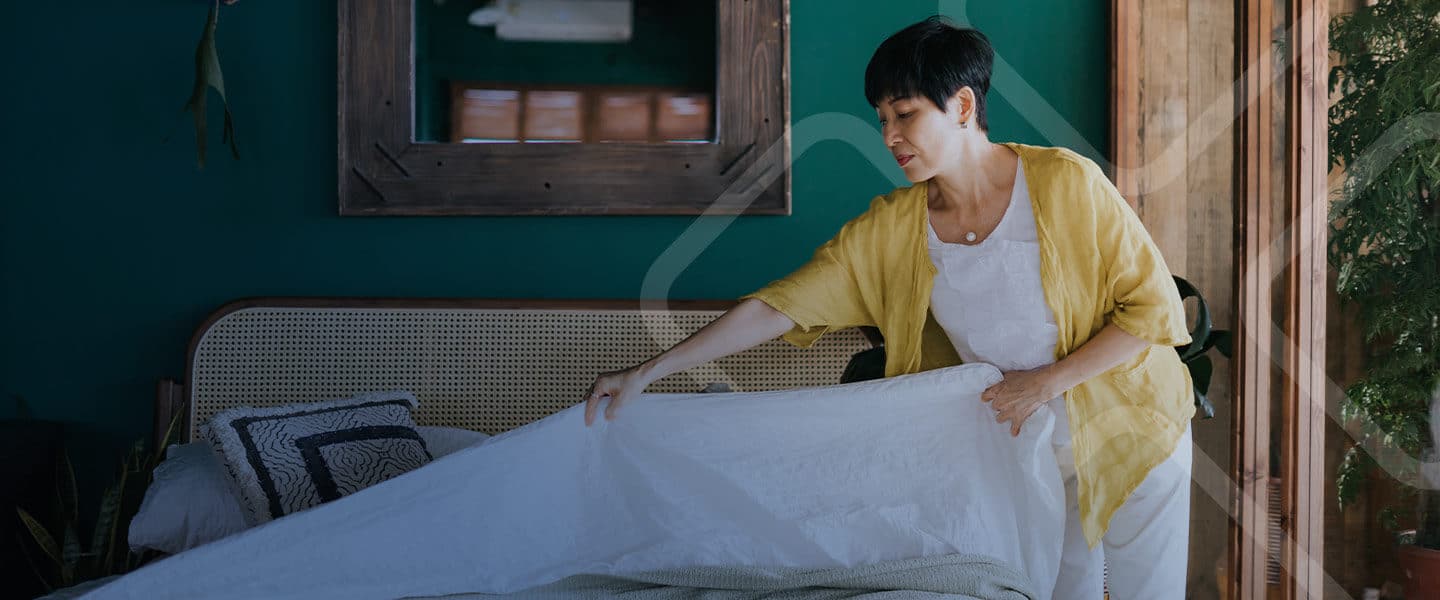 Person Making a Bed