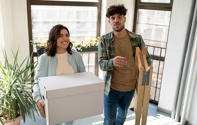 Young couple moving into their new home