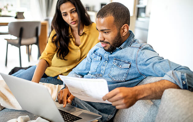 Couple reviewing their finances.