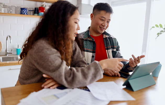 asian couple working on their finance